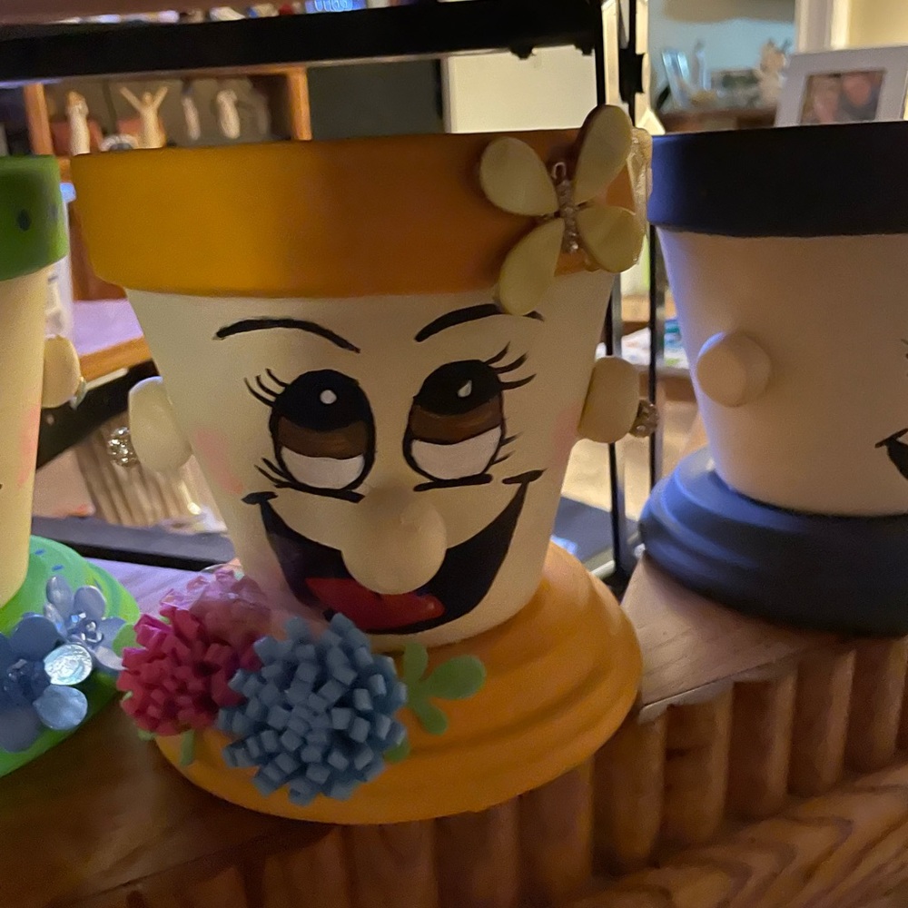 Each pot is hand painted and made with love.
